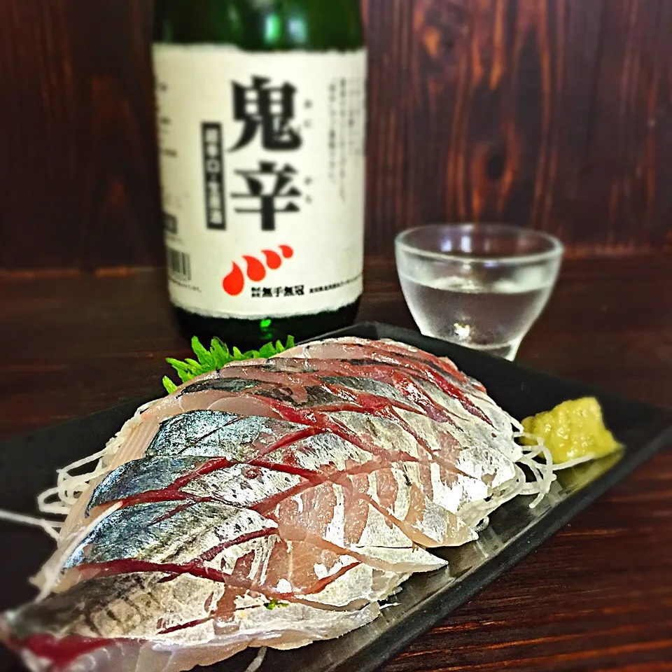 Snapdishの料理写真:今宵の一酒一肴『鬼辛』と『鯵の刺身』|ち〜おんさん