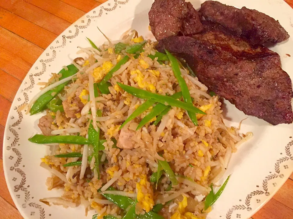 Fried rice with pork, bean sprouts, pea pods and fresh eggs with BBQ tri-tip steak|Michele Fortunatiさん