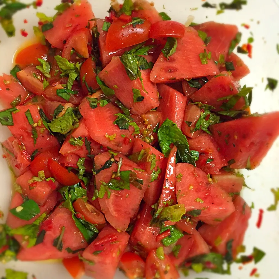 Watermelon-cherry tomato salad with thai basil, mint and chili|Liesbeth Maliepaardさん