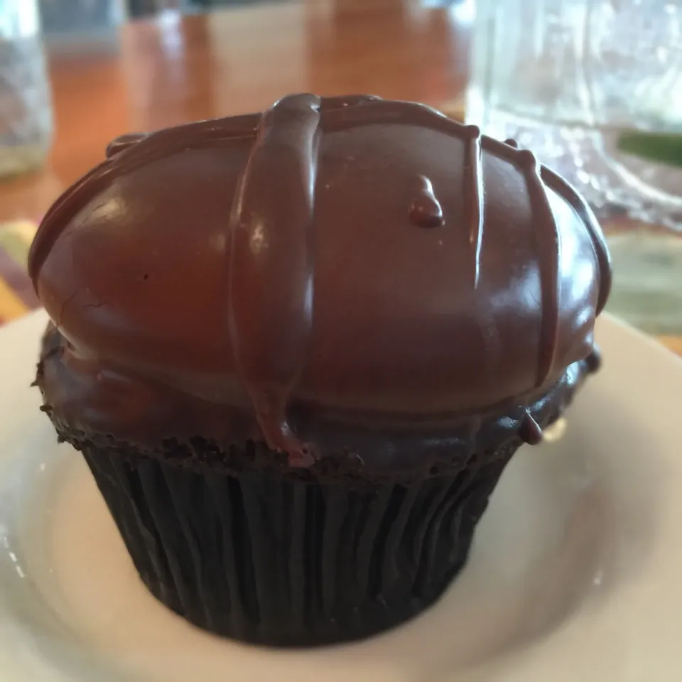 Snapdishの料理写真:Chocolate caramel Cupcake topped with caramel mousse dipped in ganache.|Kkartsさん