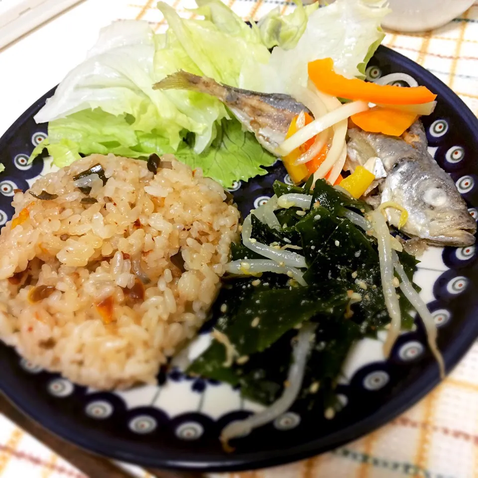 Plate: dry tomatoes rice, marinated small horse mackerel,|KEIKOさん