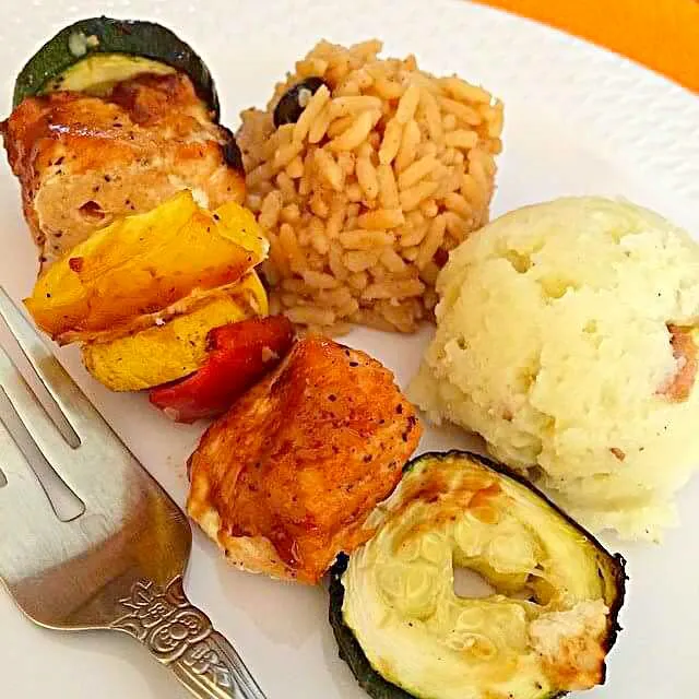 Snapdishの料理写真:Baked BBQ Tandoori Salmon Kabobs with Bell Peppers (from our garden) Zucchini & Squash; alongside Rice and Beans & Garlic Mash. 🍴👌😋 #easypeasy#theartofplating #|CHUENCHAIさん