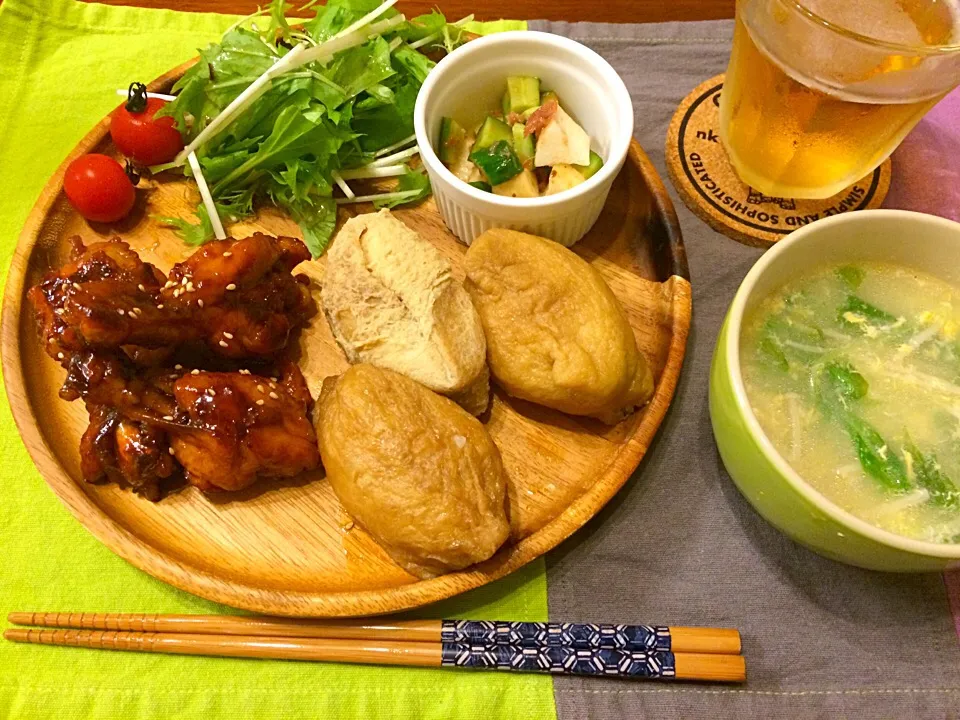 手羽元の甘辛さっぱり煮 五目ごはん入りおいなりさん  水菜と卵の中華スープ きゅうりと長芋のおかか梅あえ|haseseさん