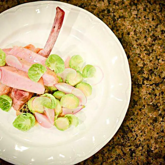 Pork chop, Brussels sprouts, radish, and green peppercorn sauce.|CHUENCHAIさん