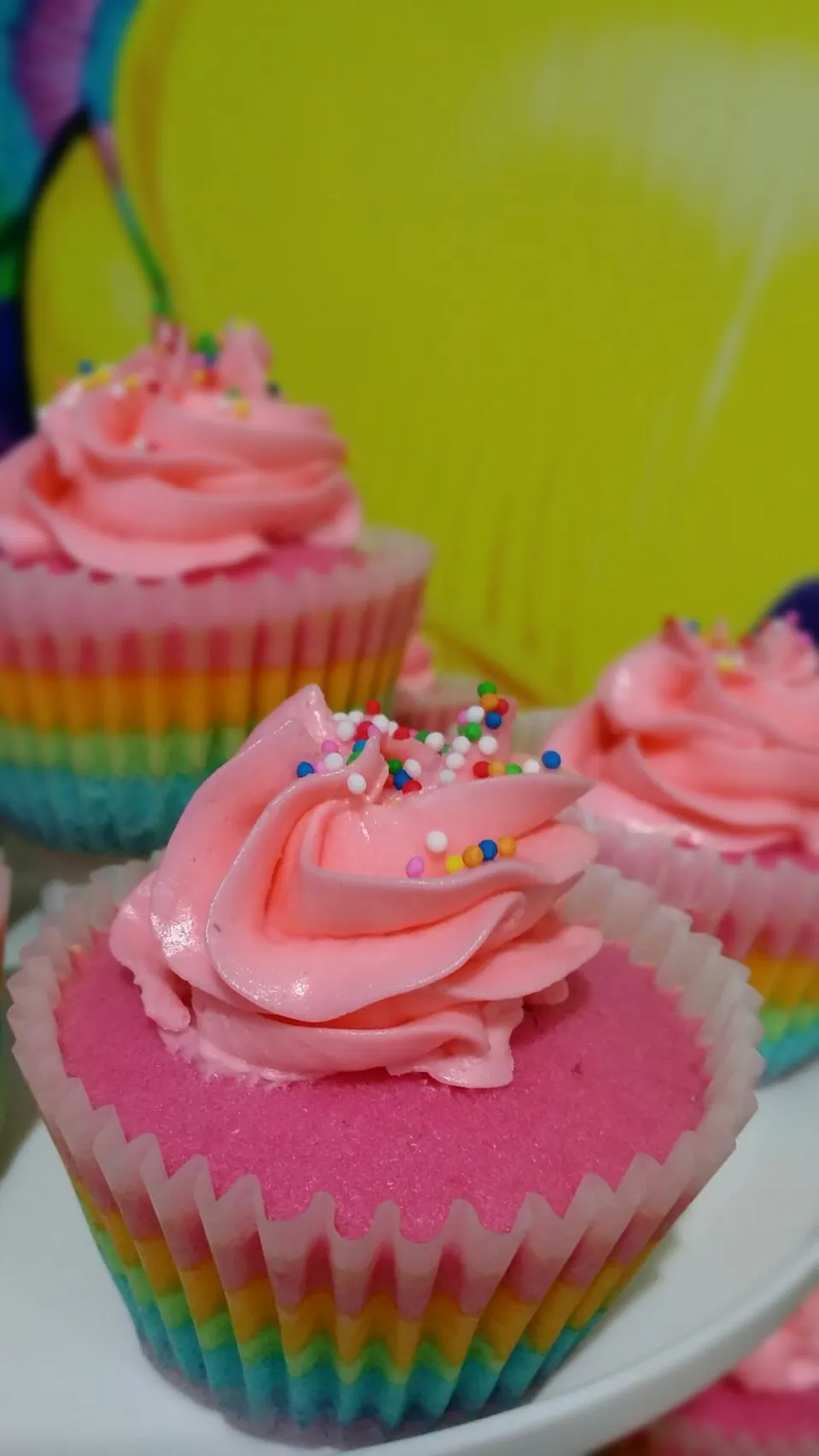 Rainbow cupcake with strawberry frosting|jorccyさん