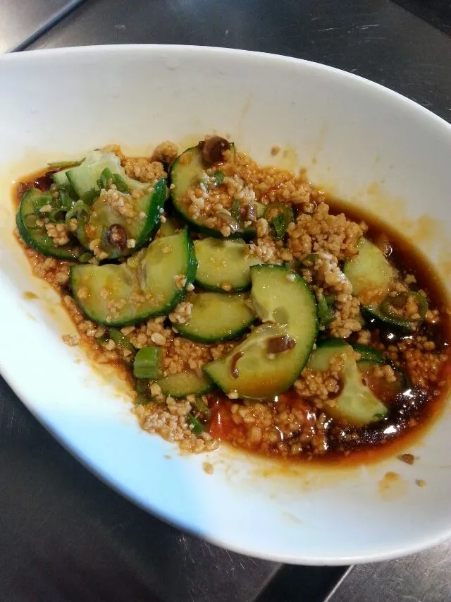 Snapdishの料理写真:spicy cucumbers with peanuts. my snack at work.|Polly Gelfusoさん