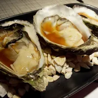 Snapdishの料理写真:grilled oysters with ponzu sauce