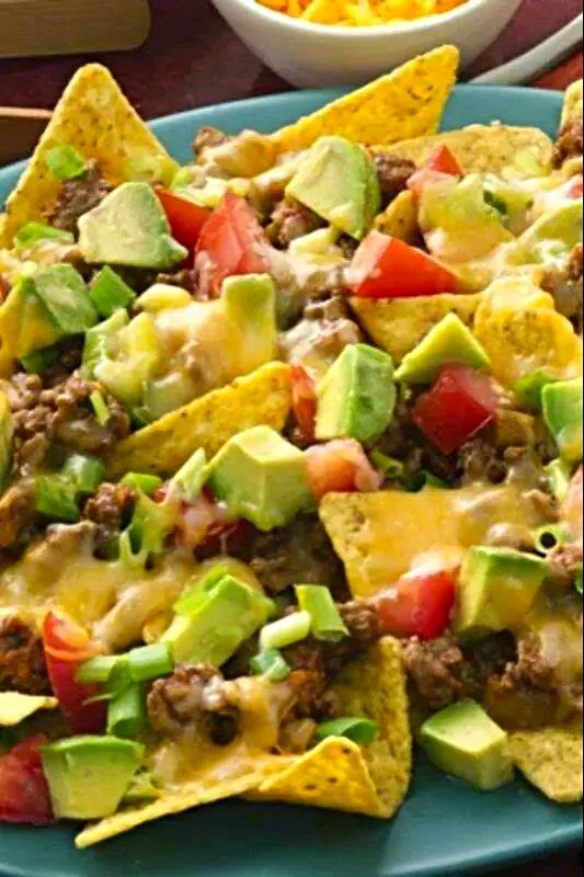 Nachos W/ Nacho Cheese, Diced Tomatoes, Avocado, Green Onions W/Steak....Mmmmm|Sheila Harrisさん