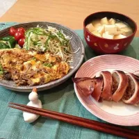 Ikameshi(Stuffed squid rice). Avocado Natto Omelet with salad. Tofu and Deep-fried bean curd miso soup.