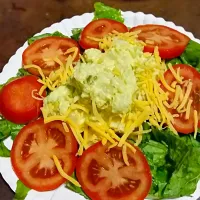 Snapdishの料理写真:Green romaine lettuce Salad #tomatoes . Topped with potato salad and sharp cheddar cheese|mataji armourさん