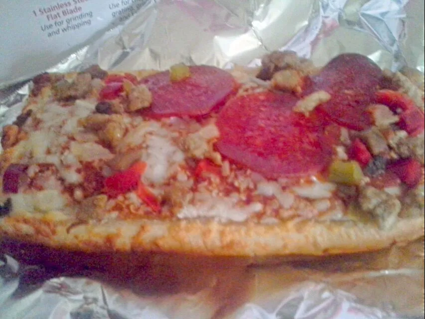 Snapdishの料理写真:Pizza Bread W/ Pepperoni, Italian Sausage, Bell Pepper, Onion,  Mozzarella Cheese, Tomatoe Sauce|Sheila Harrisさん