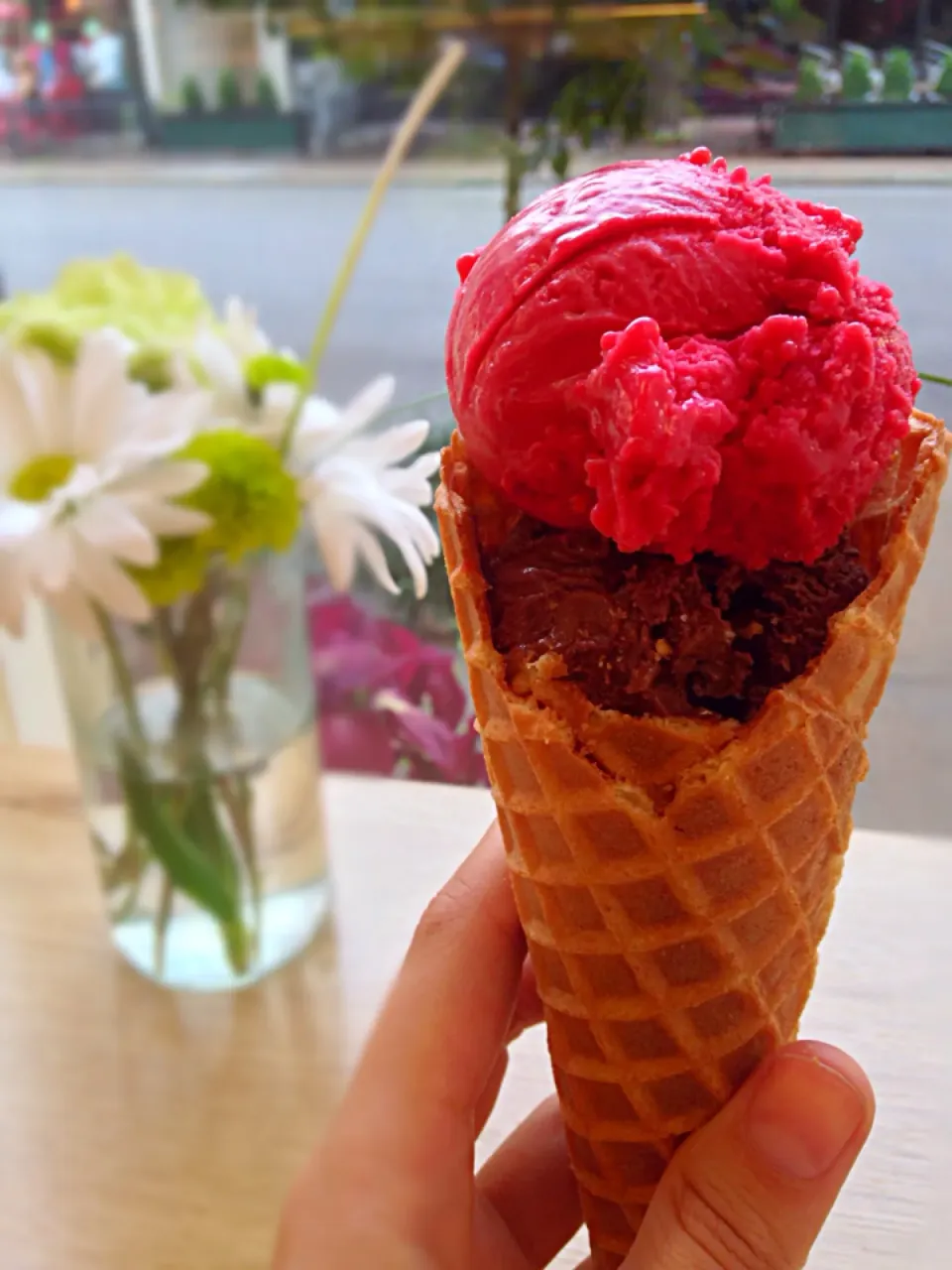 red rapsberry sorbet and darkest chocolate ice cream in a waffle cone|eliseさん