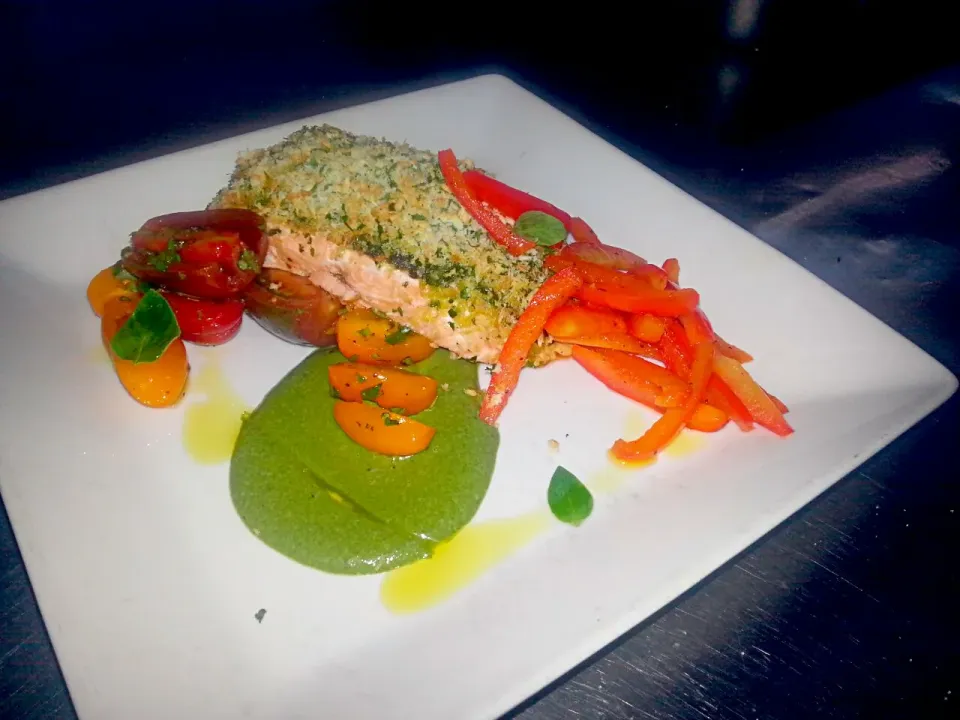 pesto panko salmon with oregame tri color tomatoe salad and a warm pickel of red peppers finished with a s spinach reduction cream anglaise|Jayson Mccrimmonさん