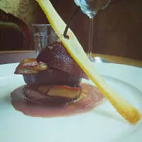 poached red wine pear with pan fried duck liver|alain bernardさん