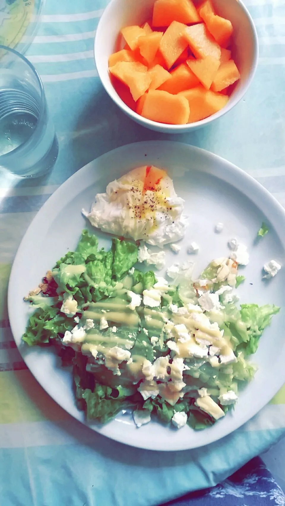 #Lunch - poached egg, lettuce, cucumber, feta cheese with French dressing & melon ♡|Mélissaさん