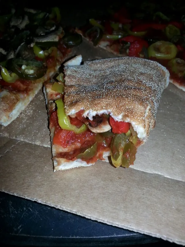 folded Brooklyn style veggie pizza. (roasted reds, jalapeño, hots, and mushroom.|Polly Gelfusoさん