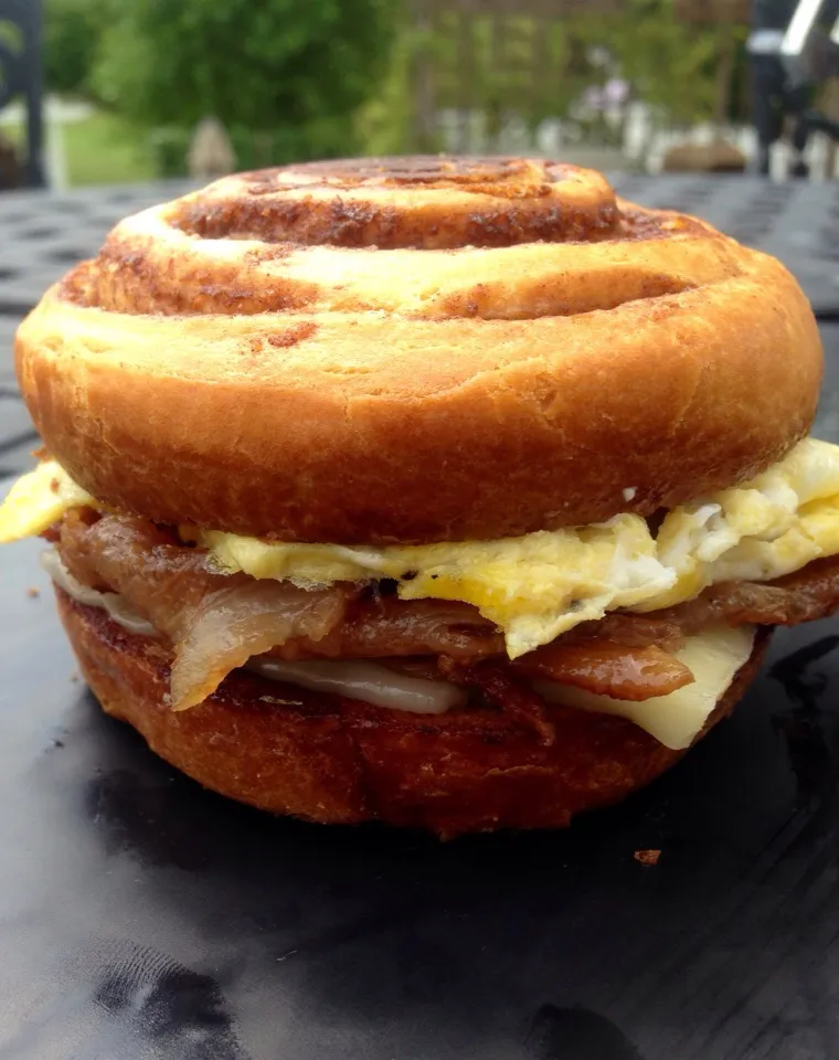 Snapdishの料理写真:Cinnamon Roll Bacon Egg And Cheese Breakfast Sandwich|peggy waldonさん