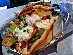 Gyro= Lamb Meat ,Chedder Cheese  Cucumber  Sauce ,Onions, Romain Lettuce ,Tomatoes , On A Grilled Pita Wrapped  in Foil Too Keep it Fresh!|Sheila Harrisさん