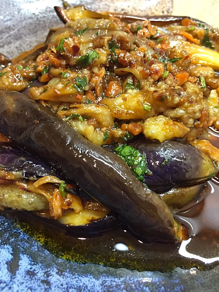 Snapdishの料理写真:Crispy Garlic and chili infused sesame oil marinated baby Aubergine|Michael Kohlさん