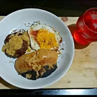 Snapdishの料理写真:Beef patty with butter wine thick sauce, poppy seeds bread, fried egg & ice frambozen syrup|ibby lerrickさん