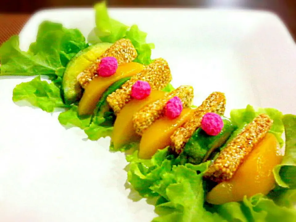 Snapdishの料理写真:Avocado Peach in Sesame Brittle Dessert (w/ sugar coated nuts) Caramel Syrup ✔|🌼 Pooja's Kitchenette 🌼さん