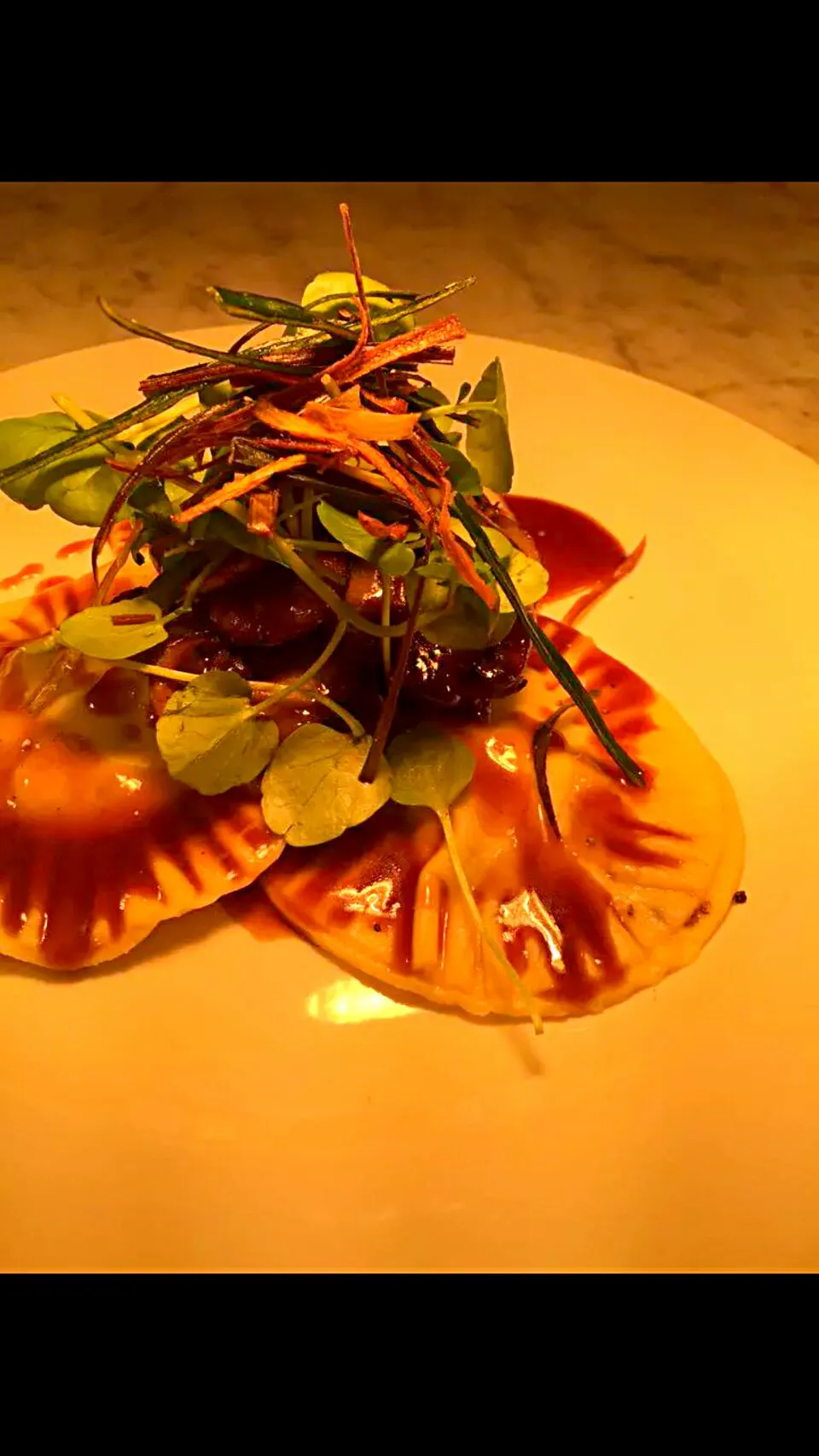 pigeon and chestnut mushroom ravioli with sauté mushroom, crispy leeks and a game reduction|Lewis Jonesさん