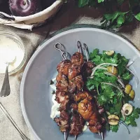 Grilled chicken liver with garlic dressing and parsley salad