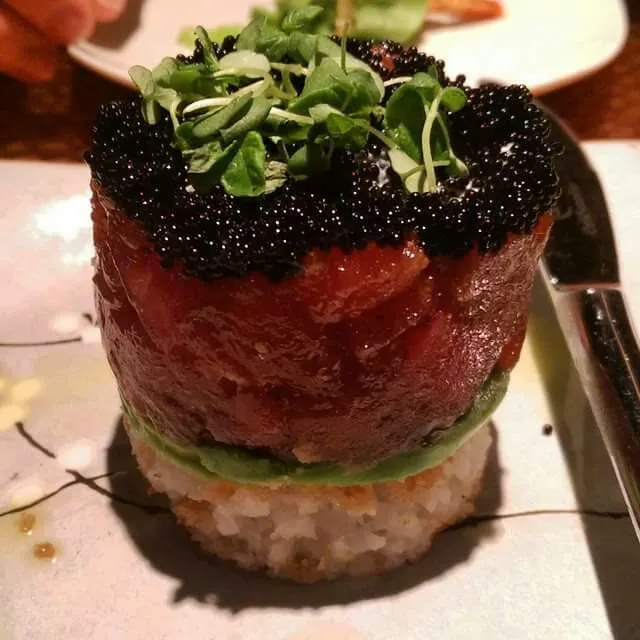 The ahi tuna #parfait. A clever twist on sweet...becoming savory.
In layers from top down: caviar, creme fraiche, tuna, avocado, crispy rice cake. Yum!

#fusion|CHUENCHAIさん