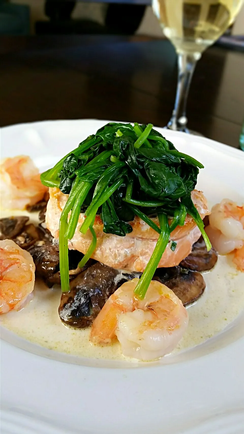 Stuffed Salmon with Baby Portobello Mushrooms, Spinach and Gulf Shrimp in a Beurre Blanc Sauce.|John Tompkinsさん