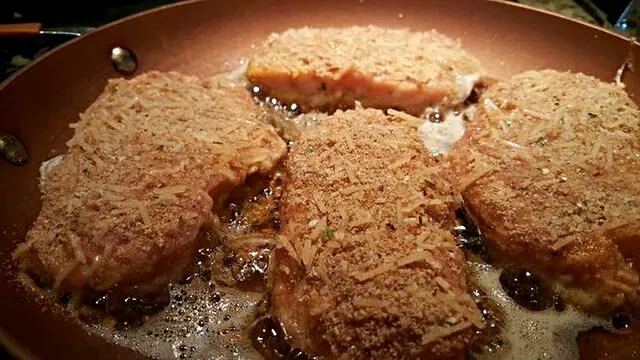 Snapdishの料理写真:My friend is preparing Parmesan Crusted Pork Chops #Pork #Lunch ❤ #Main dish 😊|Alisha GodsglamGirl Matthewsさん