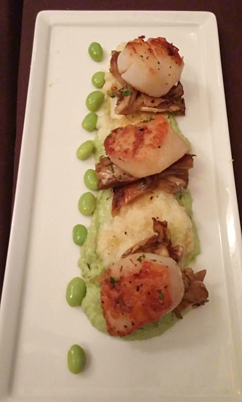 Pan seared scallops with cauliflower mashed potatoes, edamame puree,maitake mushrooms with an orange ginger sauce #4thsemester #culinarystudent #cookingwithizzy|Isabelさん