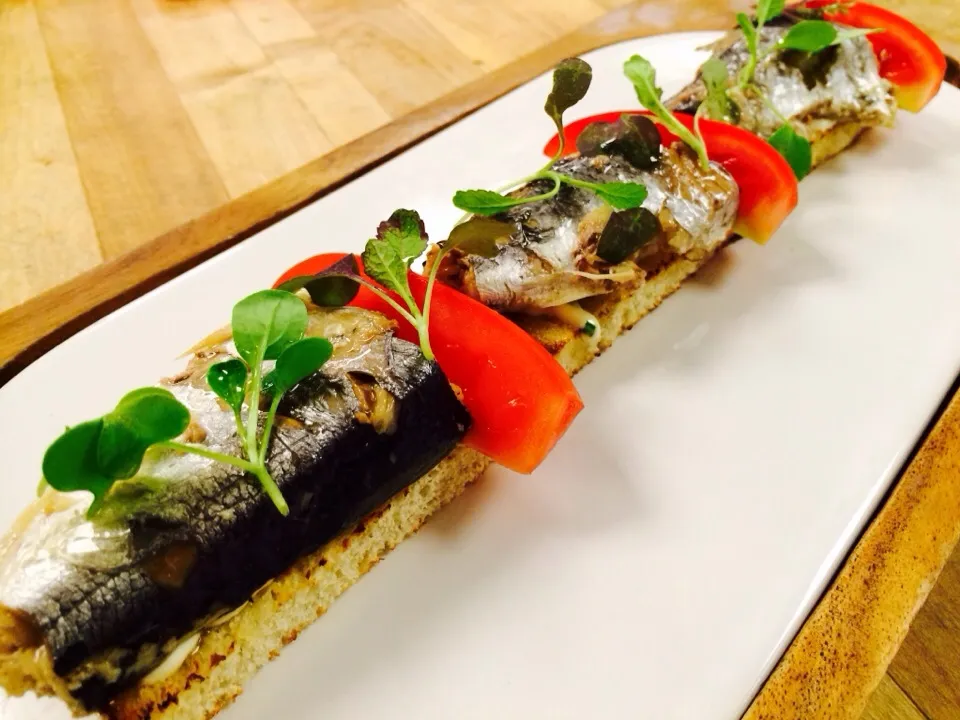 Pickled herring with candied tomato|shaun spoonerさん