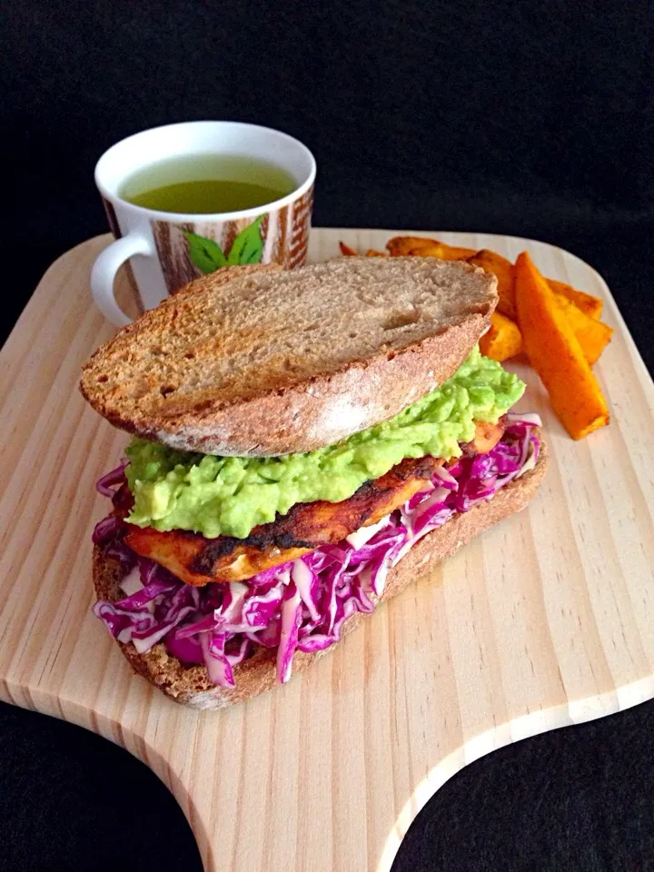 Snapdishの料理写真:Grilled curry chicken sandwich with purple coleslaw & smashed avocado. Spicy baked sweet potato wedges, sencha 🍵|coxiella24さん