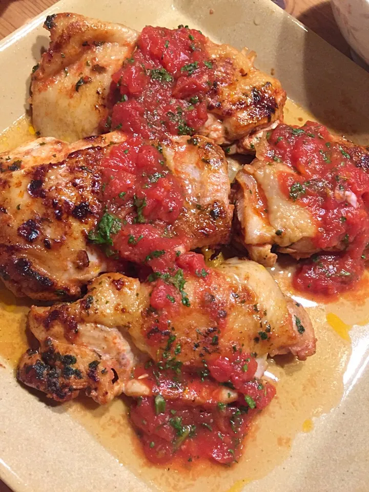 chicken garlic steak in tomato sauce|Reiko Araiさん