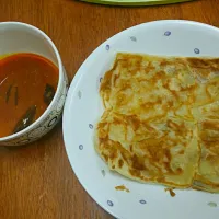 Snapdishの料理写真:roti canai with curry. awesome.|anrehan11さん