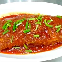 Snapdishの料理写真:Deep fried fish with tomato sauce.|mawlay gueさん