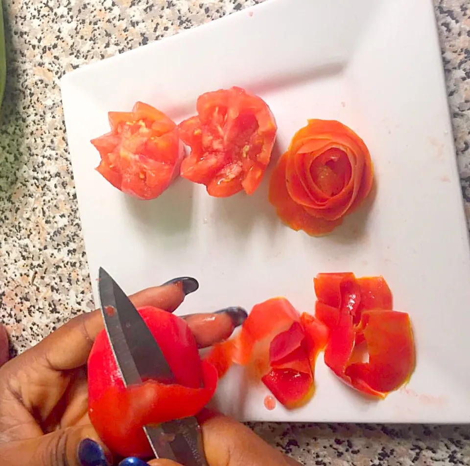 Snapdishの料理写真:The Process of Vegetable carving..tomatoes roses 🍅🌺|bukky danielsさん