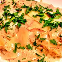 Snapdishの料理写真:Chicken breast in almond cream sauce topped with Parmesan cheese.|Kirk Awiamさん