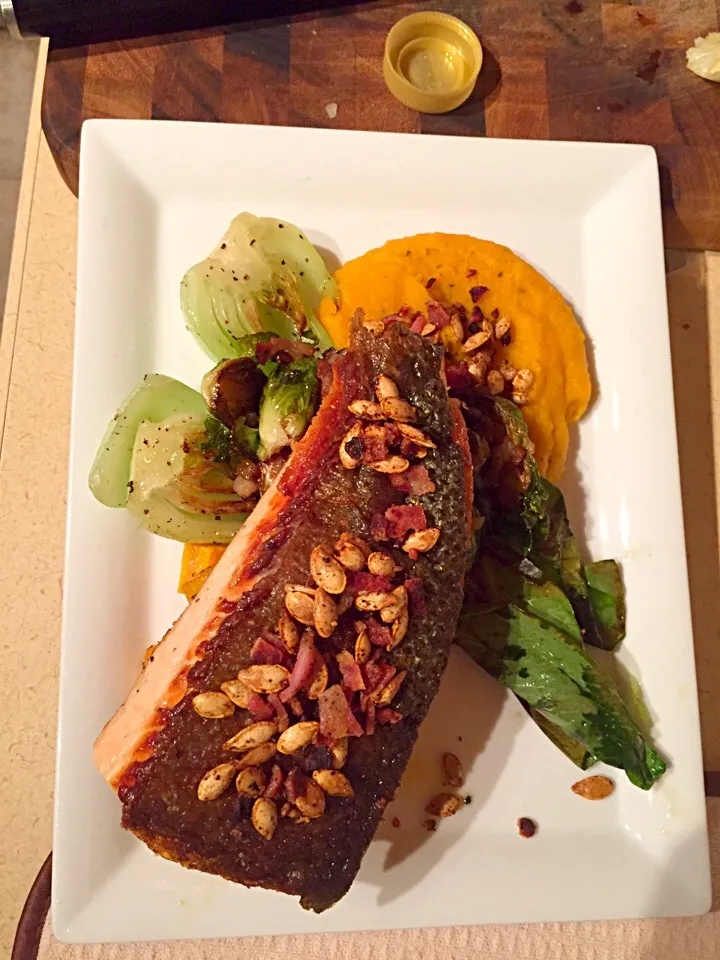 Snapdishの料理写真:Crispy skin salmon, butternut squash two ways, bok choy and bacon-squash seed crumble|Owen Wolfertzさん