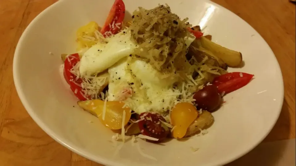 Truffle Salt Baked Yukon Gold Fries with Fried Eggs, Cherry Tomatoes, Parmesan, Black Pepper, and Lemon Garlic Kohlrabi Kraut|Christina Sasserさん