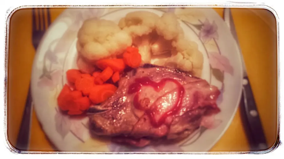 Pork cutlet /chop with steamed flower carrots and couliflower|Najeskaさん