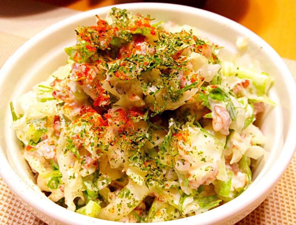 Coleslaw with party leftovers; wild rice, yoghurt, lemon and celery leaves.|Kirk Awiamさん