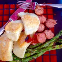 Snapdishの料理写真:Pierogies kielbasa and asparagus|kariさん