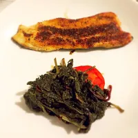 Blackened rainbow trout, braised mustard greens over sliced heirloom tomato 
#sfeatsathome #homecook #homemade #homecooking #southernfood #southerncooking #food|West Coast Southernerさん