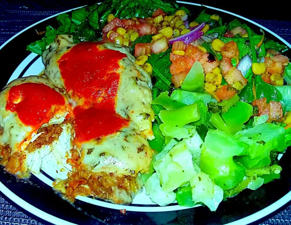 Stuffed Chicken Breast in a Mushroom and Tomato Sauce Garden Salad Topped with a Tomato and Sweet Corn Chutney with Steamed Broccoli and Cauliflower.|Juan Simmsさん