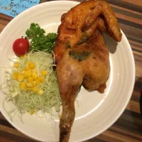 Snapdishの料理写真:鶏の半身を丸揚げ|Masatomo Komaiさん