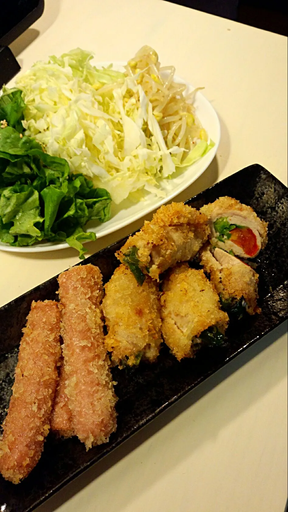 Snapdishの料理写真:ピーマンとトマトの肉巻きフライと魚肉ソーセージ揚げ( ^^)|えびてんさん