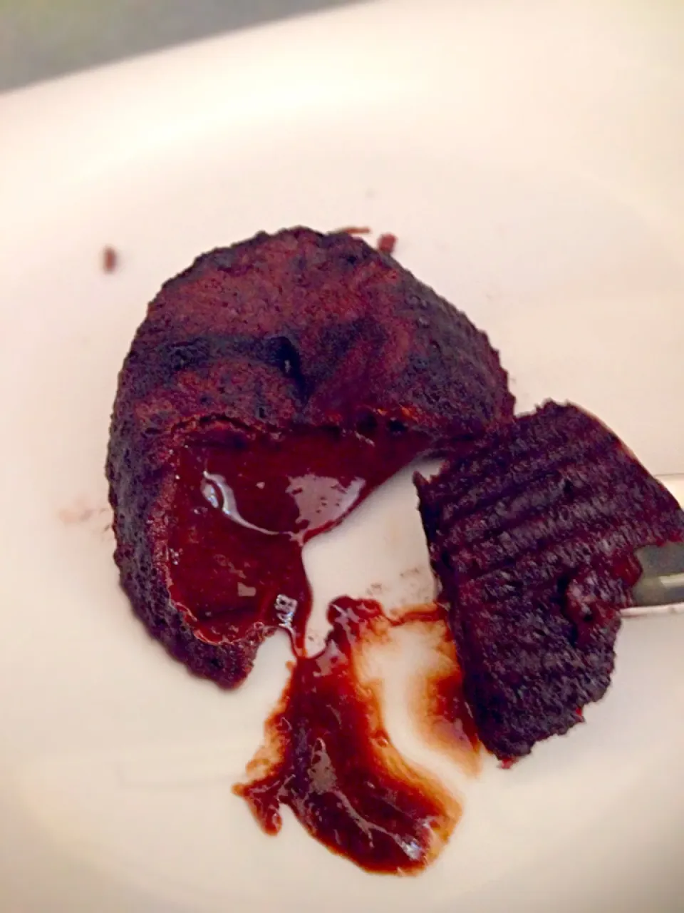 Snapdishの料理写真:Tortino dal cuore morbido al cioccolato fondente e arancia|goghiさん