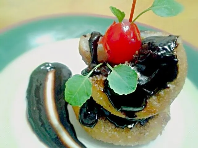 Snapdishの料理写真:red bean paste stuffed donuts in dark choco sauce #plated #foodporn|hungry_picassoさん