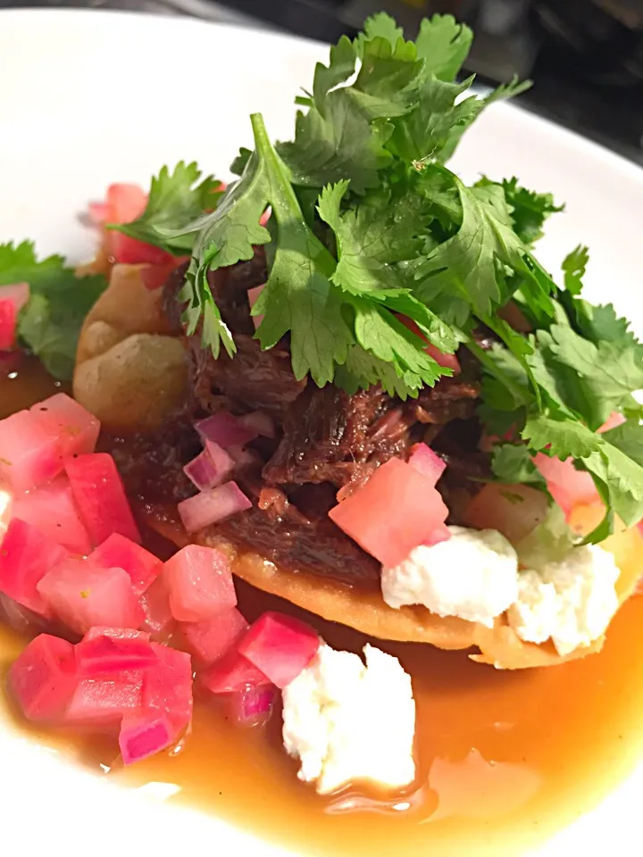 Snapdishの料理写真:Braised goat tostado, scarlet turnip salsa, chèvre, cilantro|Owen Wolfertzさん